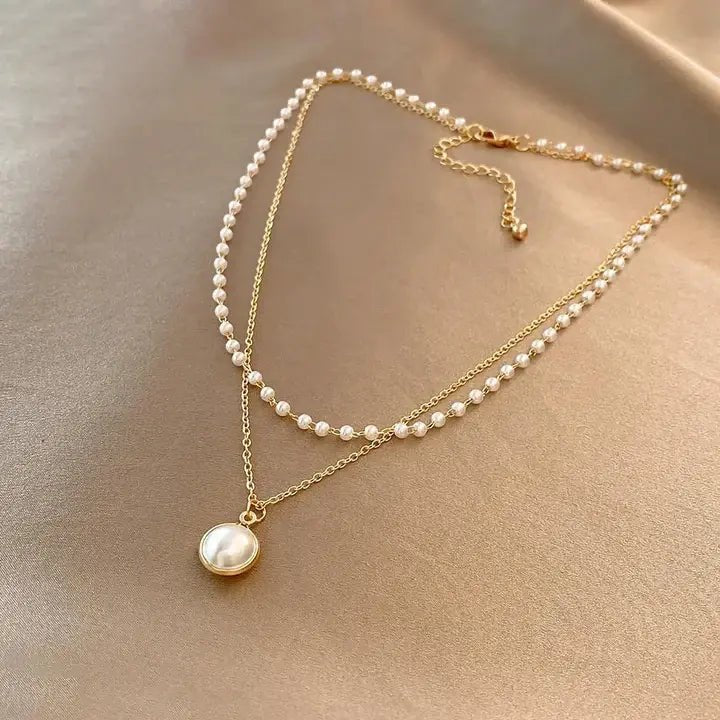 Margaret Robinson | Elegant Pearls In Gold Necklace